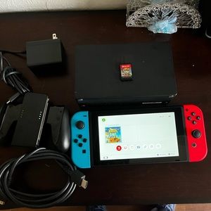 Nintendo Switch nuevo viene con todos sus accesorios y con un juego